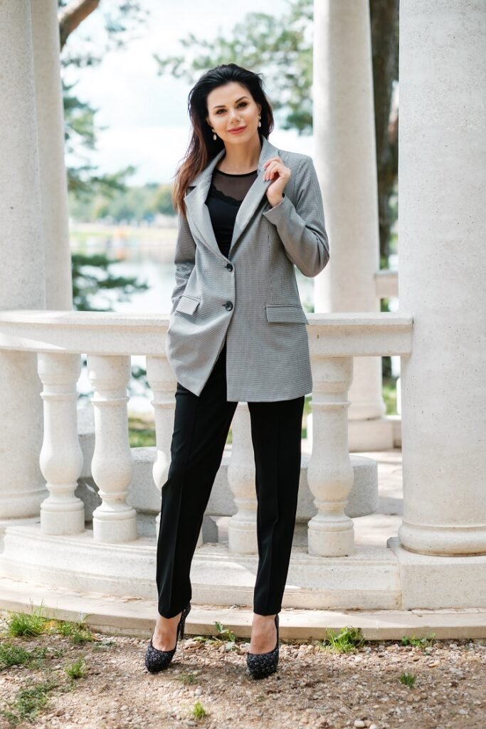 Woman in pantsuit outdoors  Business woman portrait.