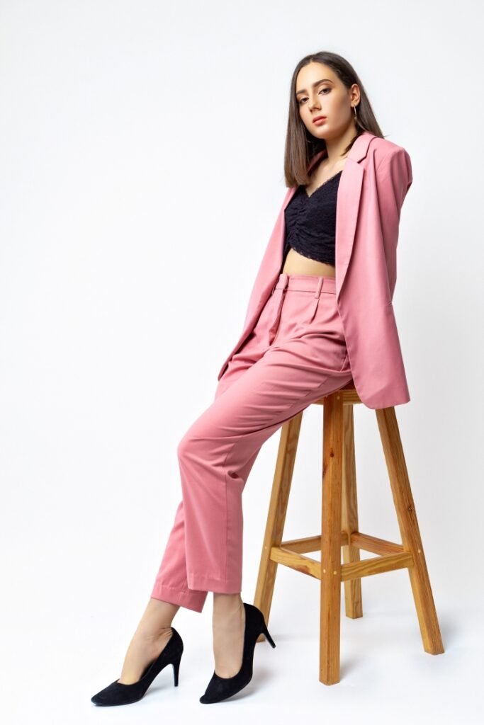 girl-pink-suit-studio-white