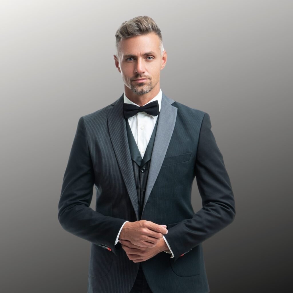 A man wearing black suits