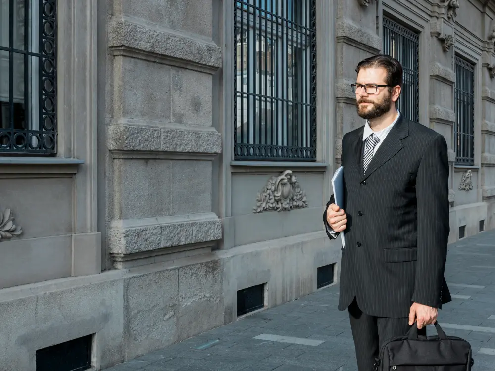 Charcoal bespoke suit for corporate lawyers in London